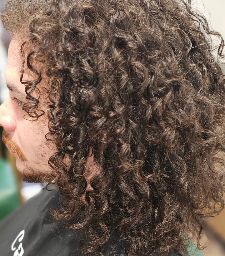 Long curly haircut and shape by Riverside Hair