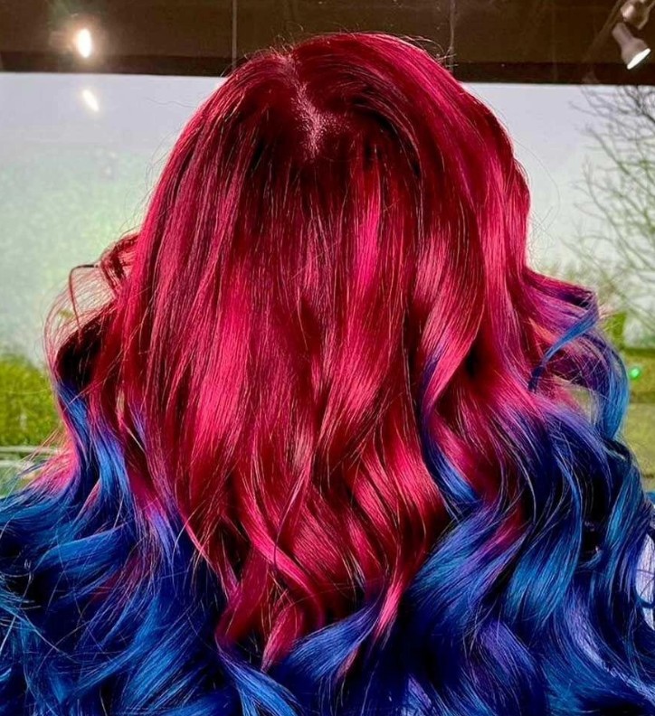 Vivid red and blue colour waves by Riverside Hair